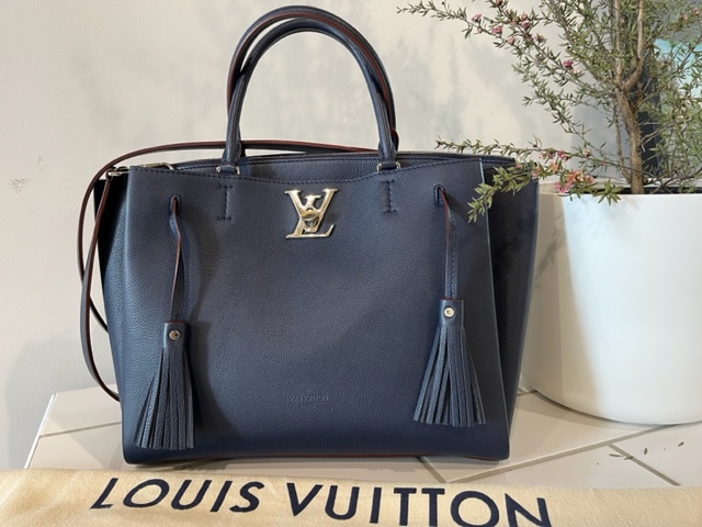 Louis Vuitton Lockmeto Leather Handbag