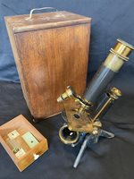 LACQUERED & BRASS MICROSCOPE, CAST TRIPOD STAND WITH BARREL ENGRAVED 