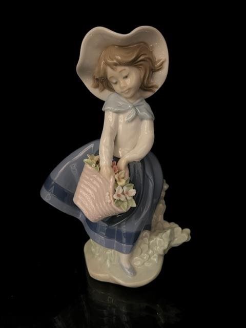 Lladro Girl with basket of flowers