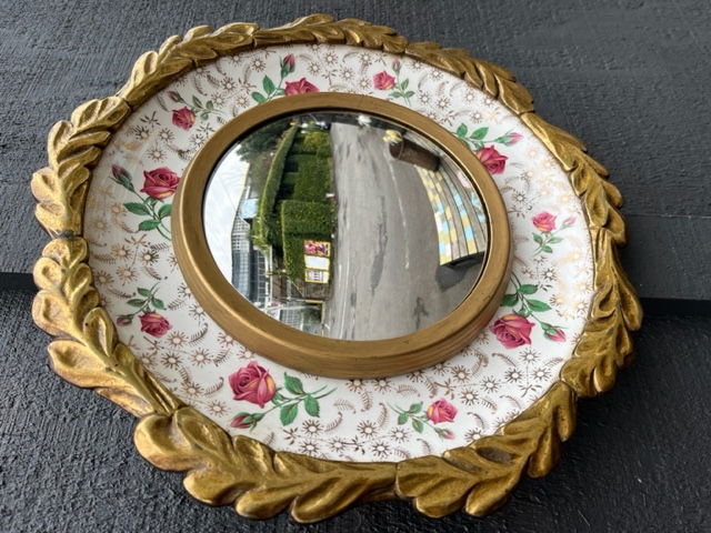 Covex mirror with brass & staffordshire porcelain frame