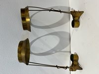 Pair of extendable brass candlestick holders with clips