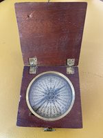 Mahogany cased brass pocket compass