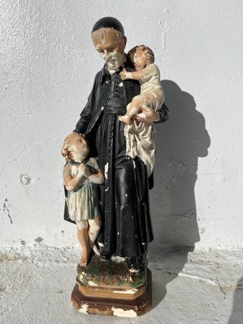 Old Religious Statue of a Priest & Children